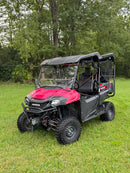 2016 Honda Pioneer 700-4 four-seat UTV with windshield, roof and winch