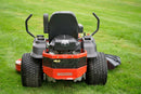 A red and black riding lawn mower with a high back seat and large treaded tires, positioned on a green grass lawn. The rear of the mower features a bright red front bumper and guard with the brand name 'BIGDOG' printed in white.